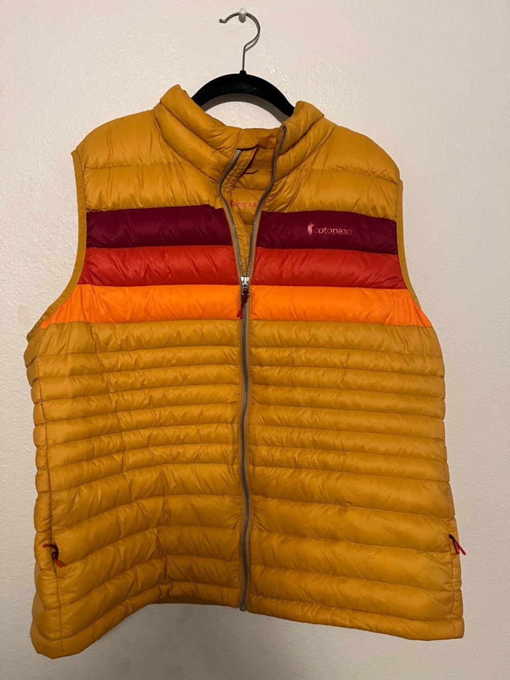 cotopaxi Mustard Yellow Puffer Vest with Red & Orange Stripes